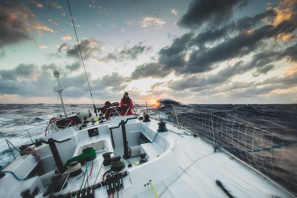Image of @davidhieatt on his sailboat, wearing a TeamO Marine BackTow lifejacket, somewhere in the Pacific Ocean.