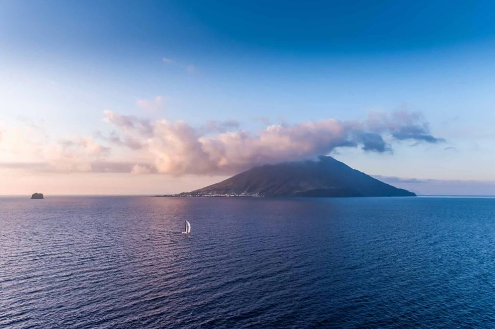 Mount Etna with yachts in front - Rolex Middle Sea Race 2021 - TeamO